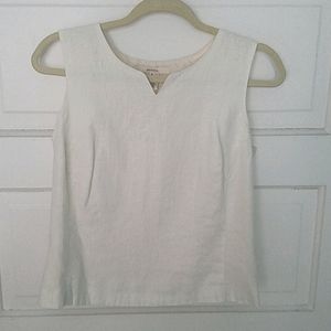 Cream sleeveless blouse